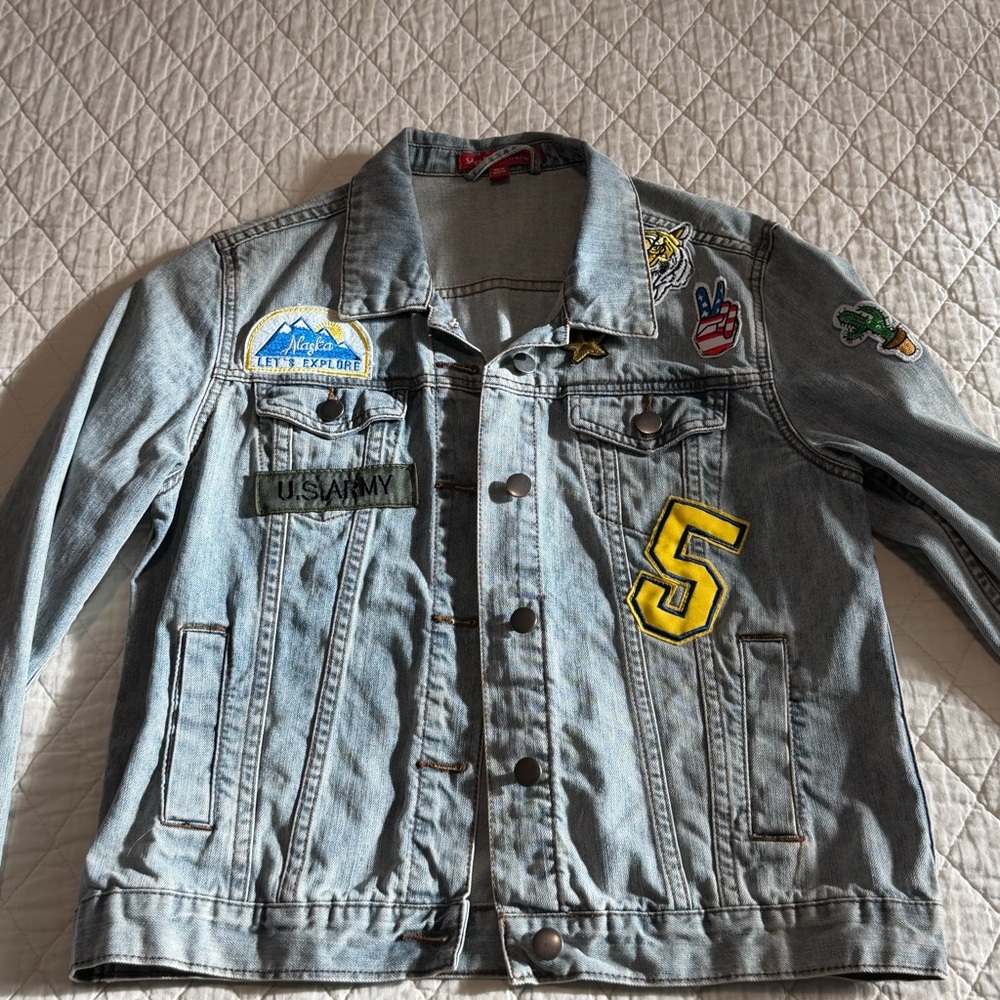 Vintage denim jacket with patches